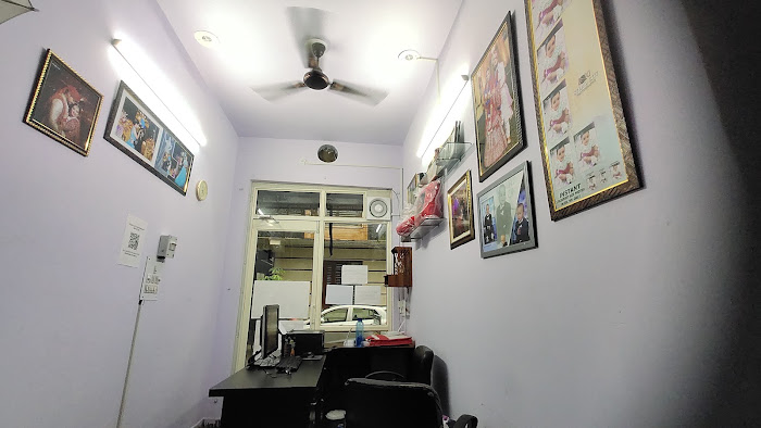 Corridor of frames — studio photography by Studio City Photography, Delhi